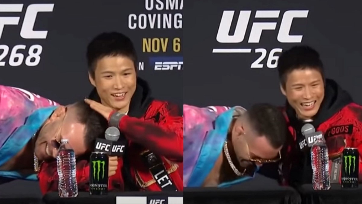 Colby Covington and Zhang Weili embrace each other during UFC 268 press conference
