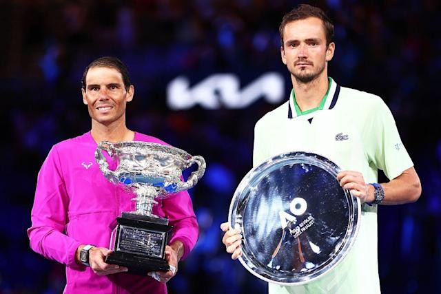 Rafael Nadal and Daniil Medvedev with their Australian Open trophies
