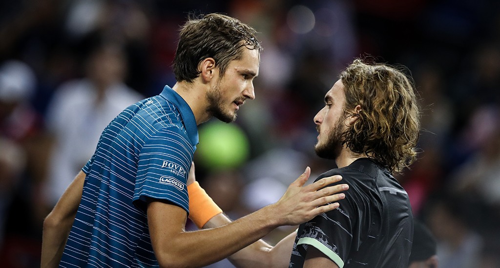 (191012) -- SHANGHAI, Oct. 12, 2019 (Xinhua) -- Daniil Medvedev(L) of Russia shakes hands with Stefanos Tsitsipas of Greece after the men's singles semi-final match between Daniil Medvedev of Russia and Stefanos Tsitsipas of Greece at 2019 ATP Shanghai Masters tennis tournament in Shanghai, east China, on Oct. 12, 2019. (Xinhua/Wu Gang)