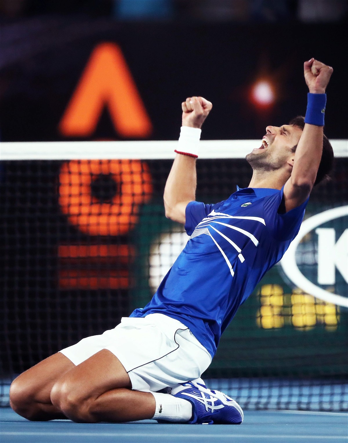 MELBOURNE, AUSTRALIA - JANUARY 27: Novak Djokovic of Serbia celebrates after winning championship point in his Men's Singles Final match against Rafael Nadal of Spain during day 14 of the 2019 Australian Open at Melbourne Park on January 27, 2019 in Melbourne, Australia. (Photo by Matt King/Getty Images)