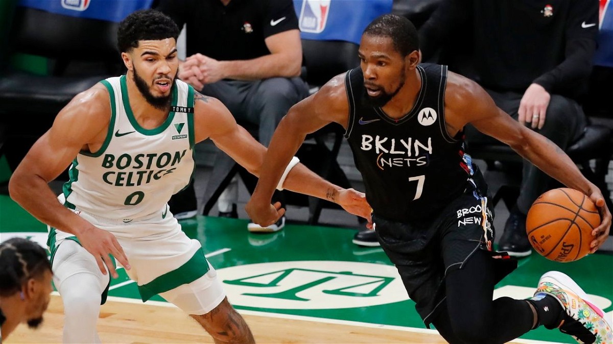 Jayson Tatum of the Boston Celtics defends against Kevin Durant of the Brooklyn Nets via Twitter