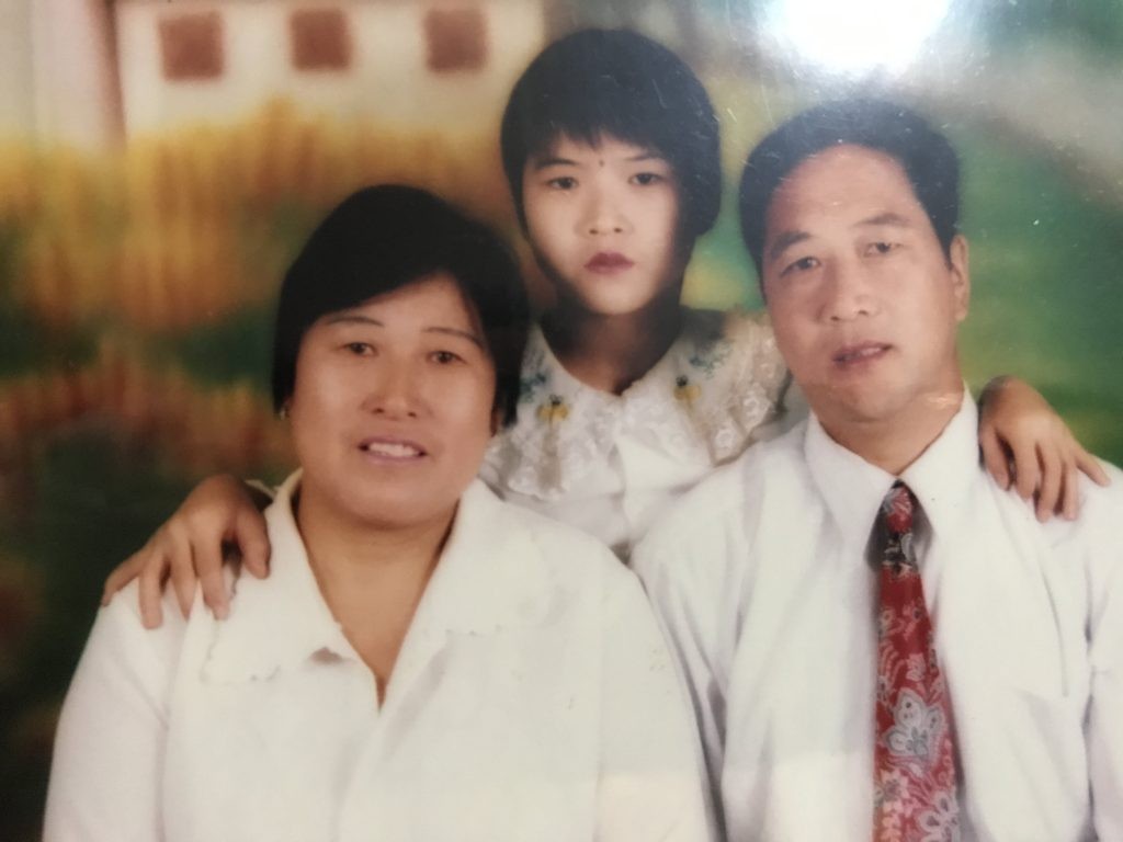 Zhang Weili with her family
