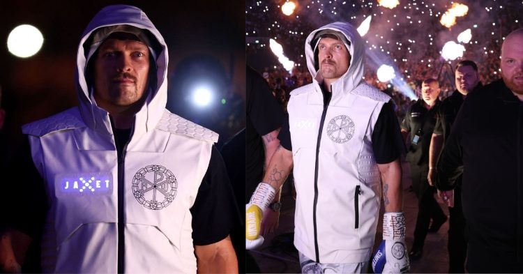 Oleksandr Usyk walks out for his fight