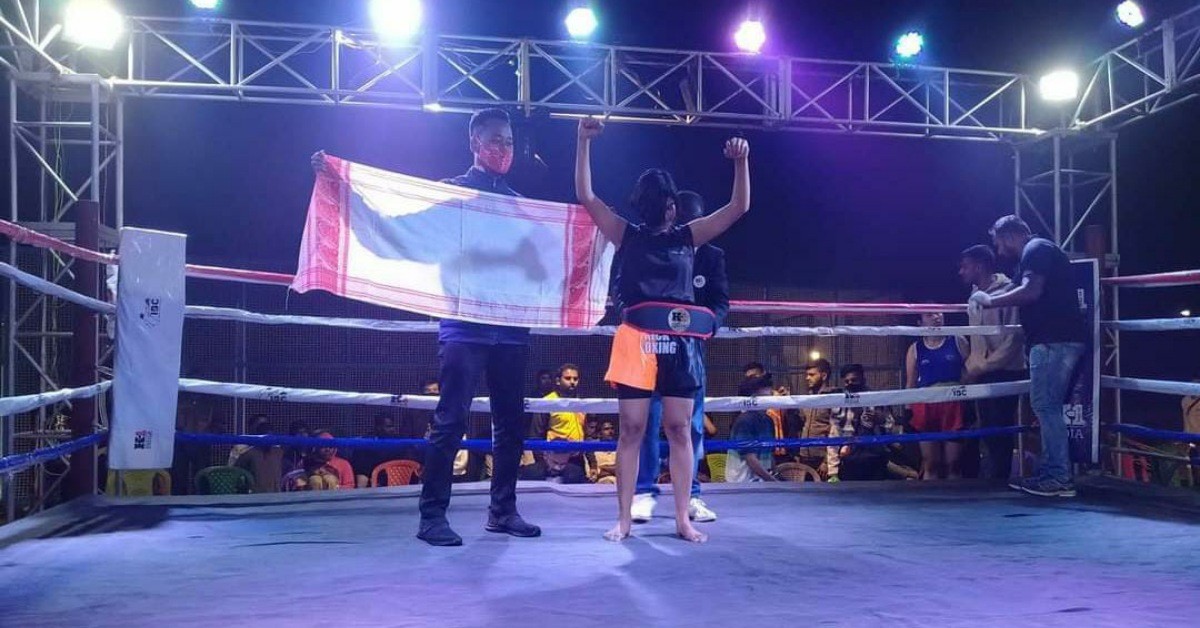Nilkahi Saikia in the kickboxing ring with coach Jyotirmoy Boro