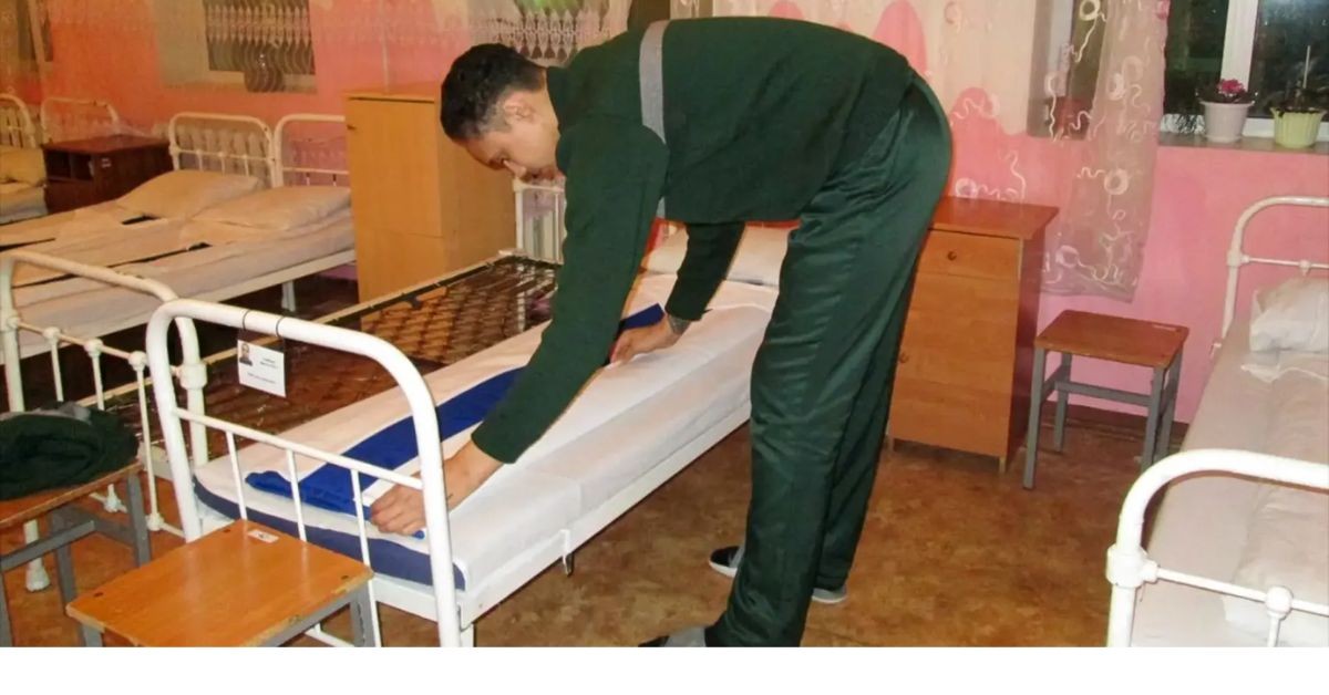 Brittney Griner making her bed in a Russian prison