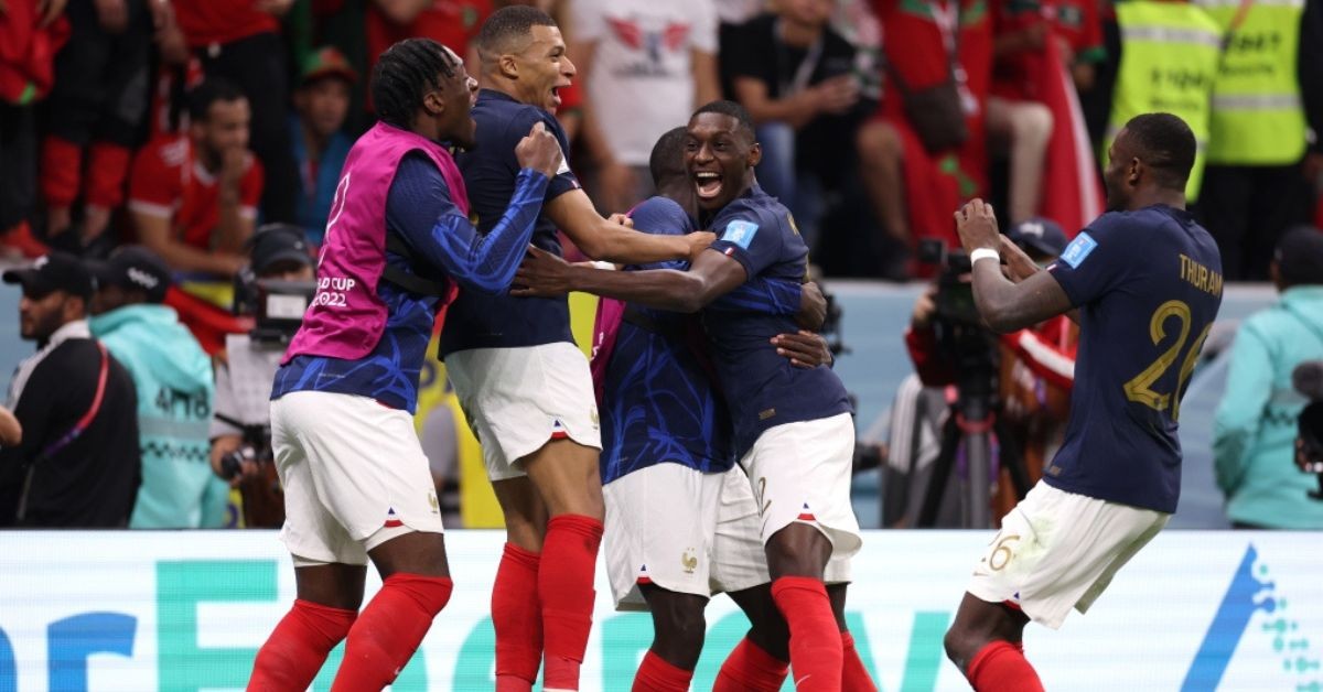French players celebrate as Kolo Muani makes it 2-0 for the French