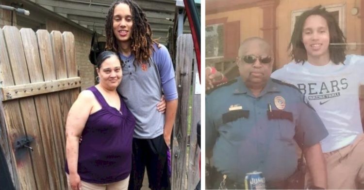 Brittney Griner posing for a photo with her mother and father