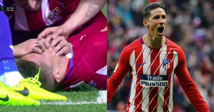 Fernando Torres injured in a collision of heads.
