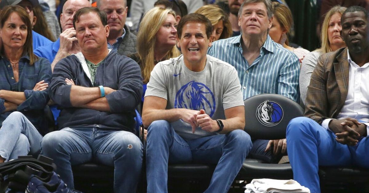 Mark Cuban seated courtside at an NBA game
