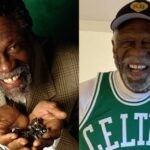 NBA legend Bill Russell wearing a Boston Celtics jersey and with his championship rings