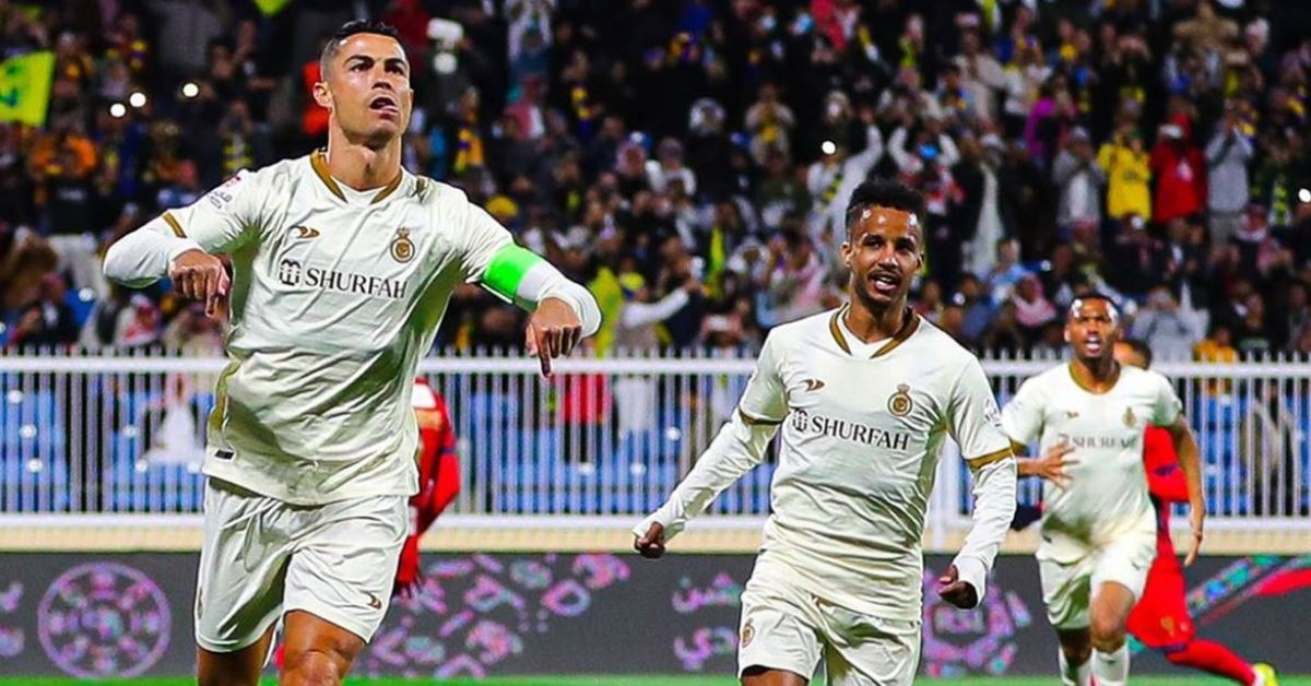 Cristiano Ronaldo celebrates after scoring a hat trick against Damac