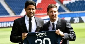 Lionel Messi with PSG President Nasser Al-Khelaifi (CREDITS: AFP Photo)