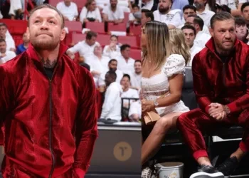 Conor McGregor (left) with the woman who accused him (right) (Source:Twitter)
