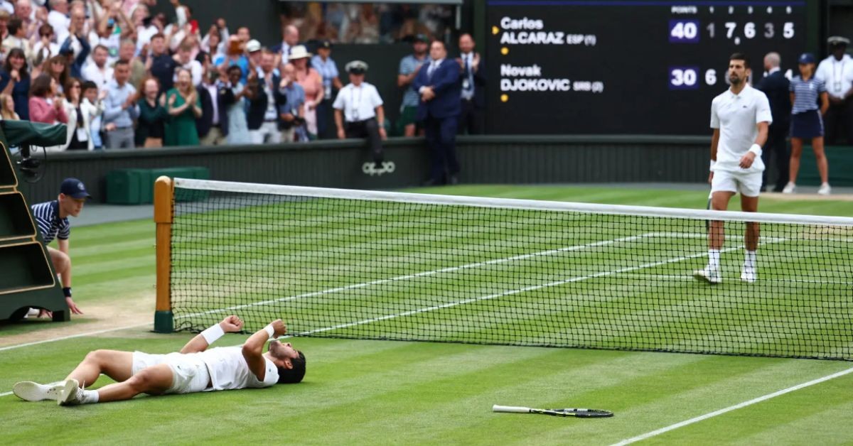 Novak Djokovic walking towards to congratulate Carlos Alcaraz after his loss at Wimbledon 