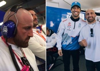 Alexander Volkanovski joins Daniel Ricciardo's pit crew for the Australian Grand Prix. Volkanovski wearing VCARB headphones while watching the race