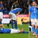 Italy players look dejected after a tough loss