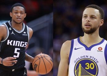Golden State Warriors' Steph Curry and Sacramento Kings' De'Aaron Fox