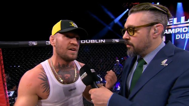 Conor McGregor talks to Dan Hardy at Bellator Dublin event